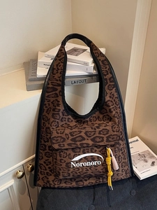 Borsa tote alla moda con stampa leopardata, logo Noronoro e nappe decorative