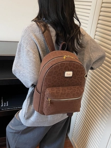 Sac à dos léopard élégant pour femme avec grande capacité et style vintage raffiné