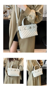 Three-way view of white woven Boston bag on trench coat showing strap and handle details