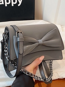 Sac bandoulière gris avec grand nœud et chaîne en métal pour femme tendance