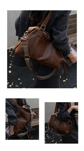 Detail of dark brown tote bag with stylish wide patterned shoulder strap and soft texture