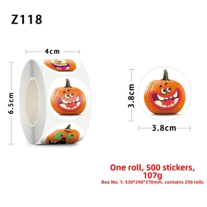 Detail view of 1.5 inch Halloween pumpkin stickers roll with 500 adhesive labels