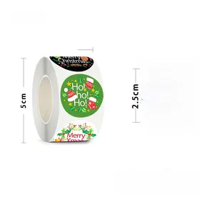 Detail view of 500 Merry Christmas roll stickers with 2.5cm diameter measurements