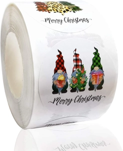 Macro detail of Christmas gnome roll stickers featuring red plaid hats and Merry Christmas text