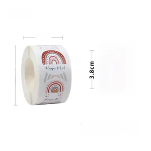 Detail of 3.8cm Happy Mail rainbow stickers showing exact roll dimensions and scale