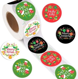Detailed view of assorted Christmas roll stickers featuring festive patterns and greetings