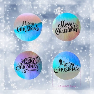 Holographic Merry Christmas roll stickers with 1.5 inch colorful laser star design