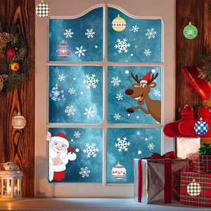 Christmas window stickers set with Santa Claus and reindeer on glass window