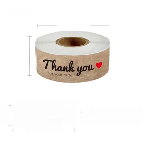 Brown kraft paper label roll with Thank you for your order text and red heart