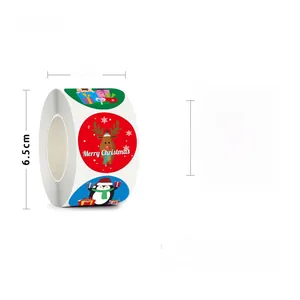Detail of 3.8cm Christmas stickers roll with festive penguin and reindeer designs
