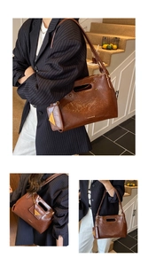 Detail of vintage dark brown faux leather tote with yellow fashion tag and zipper