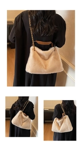 Detail of plush faux fur shoulder bag featuring golden chain and brown leather strap