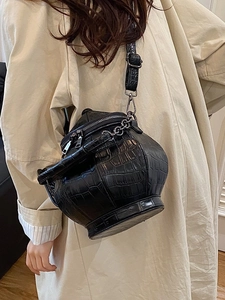 Creative 3D kettle shaped crossbody bag with black crocodile pattern and silver hardware