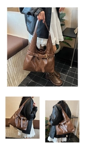 Detail view of brown vintage PU leather tote bag with decorative buckle and metal ring