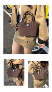Dettaglio borsa a secchiello in pelle scamosciata marrone con chiusura rotante in metallo