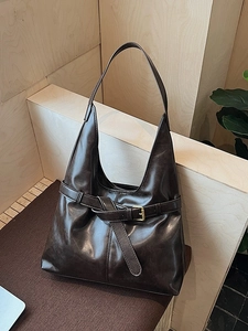 Brown large capacity leather tote bag with gold buckle strap for office commuters