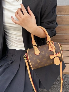 Retro monogram Boston bag for women with dual top handles and adjustable shoulder strap