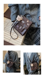Detail of dark brown PU leather tote bag with magnetic flap and cute plush bear charm