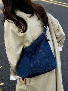 Vintage dames shopper van gewassen denim met contraststiksels en verstelbare riem