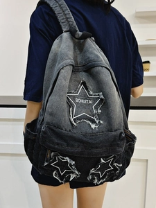Black washed denim backpack with white star patchwork and embroidery for students