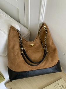 Brown suede tote bag with quilted diamond pattern and golden chain shoulder strap