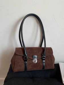 Retro dark brown matte leather shoulder bag with black straps and silver metal buckle