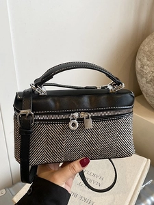 Retro herringbone and black leather box bag with dual zippers and top handle