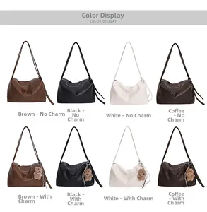Detailed grid of large tote bags in four colors with optional bear charm accessory