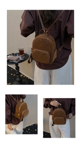 Detailansicht eines braunen Canvas-Rucksacks mit Leopardenmuster und Metall-Reißverschluss