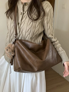 Retro brown large capacity tote bag in soft leather with cute bear charm on shoulder strap