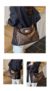 Detail of brown oil-wax leather tote with silver metal twist lock and side pockets