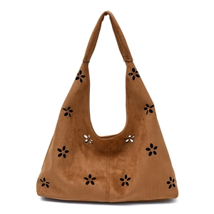 Brown faux suede tote bag with laser-cut floral patterns and large capacity style
