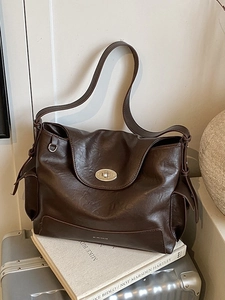 Retro large capacity dark brown leather tote bag with metallic oval twist lock closure