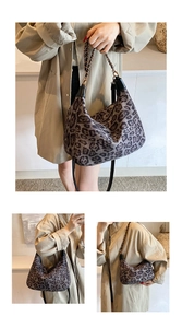 Three-way view of a leopard print crescent bag with leather and metal chain straps
