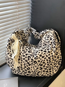 Fashionable leopard print tote bag with ruffled handles and pearl charm decoration