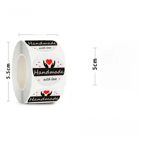 Detail view of 2.5cm handmade with love stickers roll for gift envelope sealing