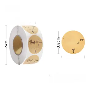 Makroaufnahme von 3,8cm Kraftpapier 'Thank You' Stickern Rolle für Geschenkverpackungen