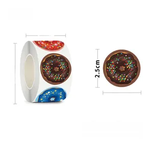 Detail of 500-count doughnut reward sticker roll with various icing designs for kids