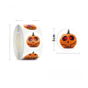 Detail of 500 count Halloween pumpkin face stickers roll with 2.5cm diameter labels