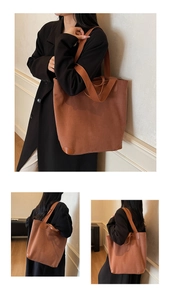 Detail of large brown corduroy tote bag showing reinforced corners and soft texture