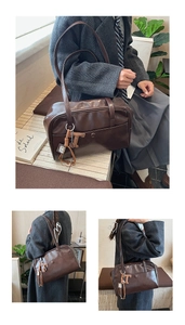 Detail of vintage brown leather shoulder bag with buckle pocket and logo charm