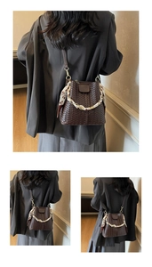 Detailed view of dark brown woven texture bucket bag with elegant printed silk scarf handle