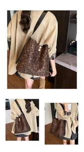 Detailed views of leopard print tote bag with wide black strap and gold metal buckle
