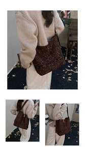 Detail of leopard print bucket bag featuring a gold metal twist lock and suede texture