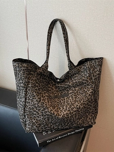 Large vintage leopard print tote bag with front pocket and durable woven straps