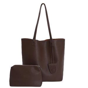 Dark brown bucket bag and pouch set in minimalist pebbled leather for women