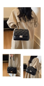 Three-angle view of black quilted crossbody bag with silver chain strap and metal lock