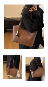Detailed views of a brown matte tote bag featuring stylish wooden bead charm accents