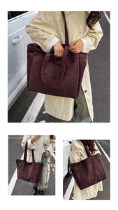 Detail of burgundy faux suede tote bag featuring a spacious interior and soft texture