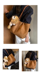 Close-up of brown woven faux leather tote bag with a plush lion keychain accessory